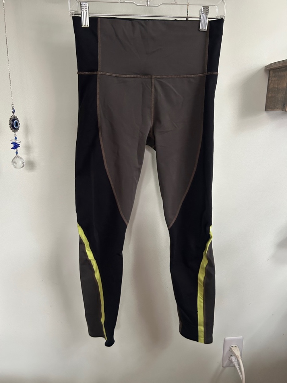 Athleta Black and Green Leggings with Yellow Accent